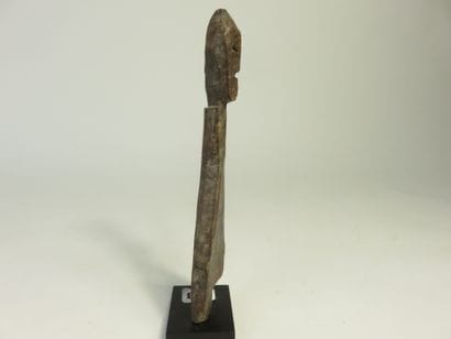 Little one-legged medicine doll. Wood with...