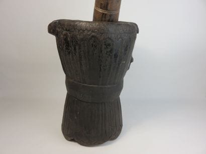 Mortar and pestle in heavy wood with patina...