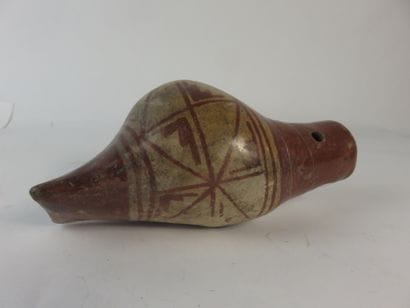 Ocarina in the shape of a shell. Geometric...