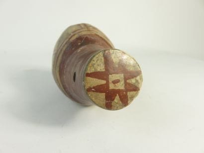 Ocarina in the shape of a shell. Geometric...