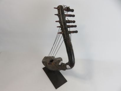 Five-stringed harp. Music played an important...