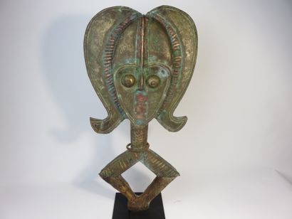 Reliquary figure. Wooden core plated with...