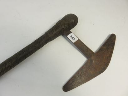 War axe decorated with brass wire braiding....