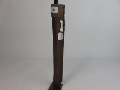 Tun-tun. It is surmounted by a small squatting...