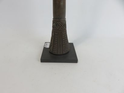 Puzzle. The base is carved with geometrical...