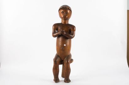 Male figure representing a byeri. The hands...