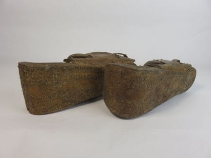Pair of sandals. Polychrome carved leather....