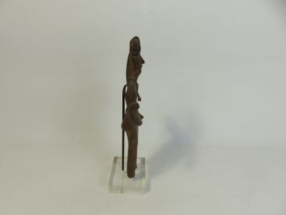 Statuette represented standing with both...