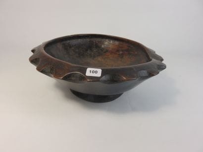 Star-shaped ritual cup. Wood with a patina...