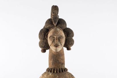 Large statue of a female ancestor represented...