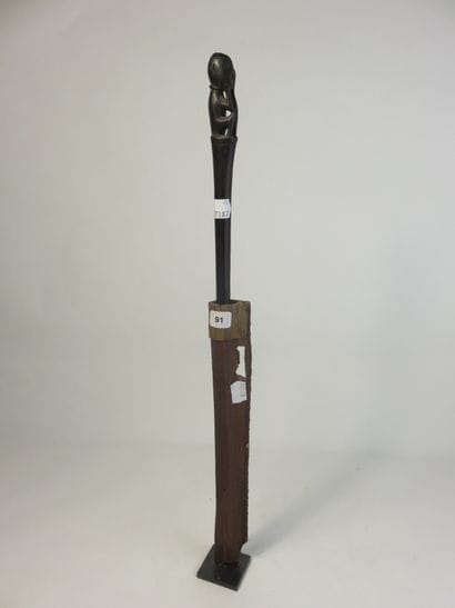 Tun-tun. It is surmounted by a small squatting...