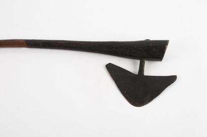 War axe. The handle is in wood and the blade...