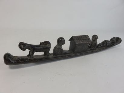 Funerary boat representing a couple of characters...