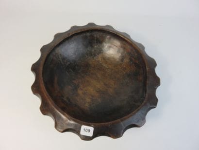 Star-shaped ritual cup. Wood with a patina...