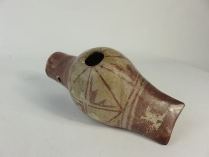 Ocarina in the shape of a shell. Geometric...