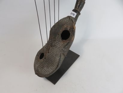 Five-stringed harp. Music played an important...