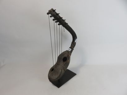 Five-stringed harp. Music played an important...