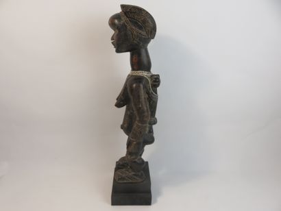 Motherhood represented standing with her...