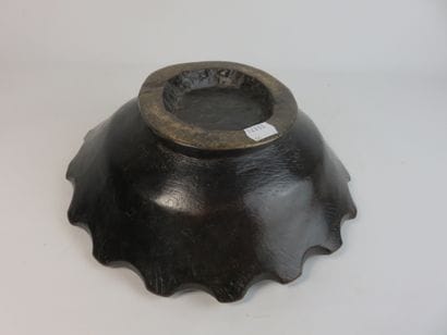 Star-shaped ritual cup. Wood with a patina...