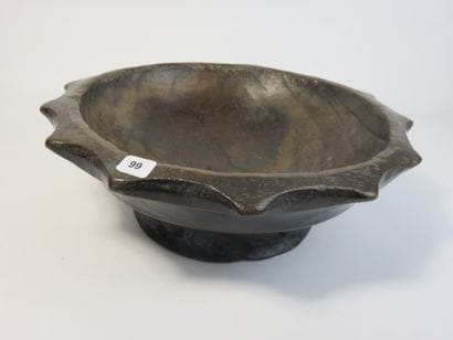 Star-shaped ritual cup. Wood with a patina...