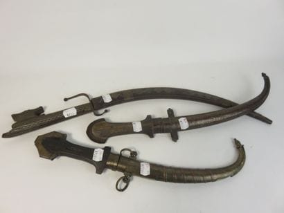 Set of three knives with their scabbard Wood...