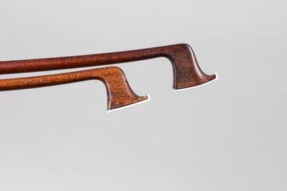 Set of 2 Mirecourt violin bows, one with...