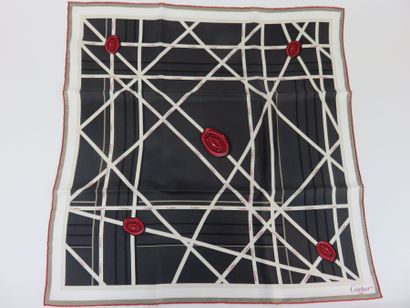CARTIER

Foulard en soie gris à motif de...