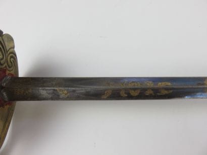 EPEE D'OFFICIER dite d’ niforme. Fusée filigranée...