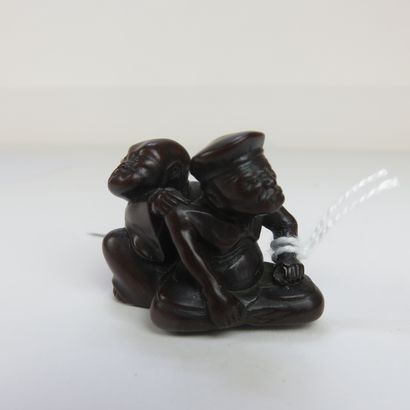 JAPON - XIXe siècle

Netsuke en bois, masseur...
