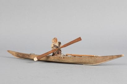 Modèle de kayak avec son chasseur vêtu d’...
