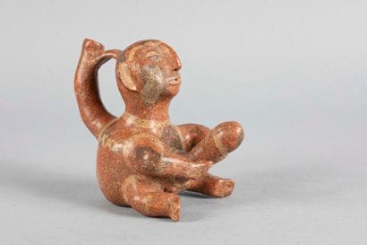 Vase à anse en étrier représentant un personnage...