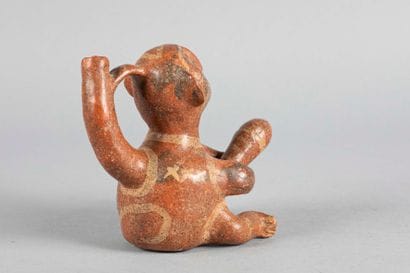 Vase à anse en étrier représentant un personnage...
