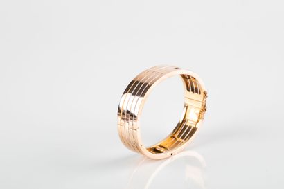 Large bracelet in pink gold, rigid, composed...