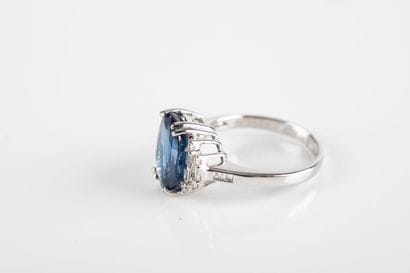 White gold ring set with a certified oval...
