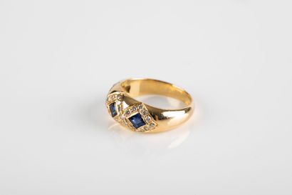 Yellow gold ring set with three calibrated...