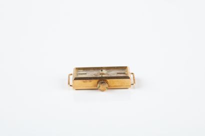 Lady's watch in gold 750 thousandths, baguette...