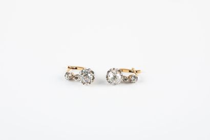 Pair of gold and platinum sleeper earrings...