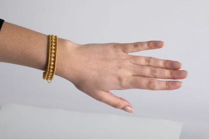 Yellow gold bracelet with pearl decoration,...