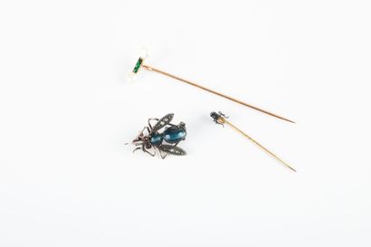 Lot comprising a gold pin set with three...