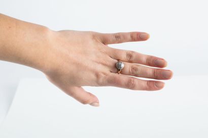 Gold ring set with a half-sphere of brilliant-cut...