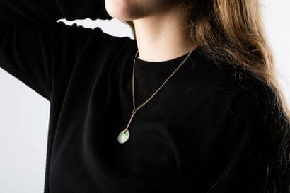Chain in yellow gold holding a pendant of...