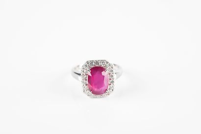 White gold ring set with a certified unheated...