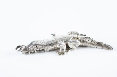 Silver pendant representing an articulated...