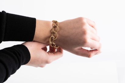 Gold bracelet, double curb chain twisted....