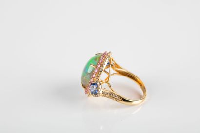 Yellow gold ring set with a large cabochon...
