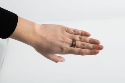 Yellow gold checkerboard ring set with diamonds...