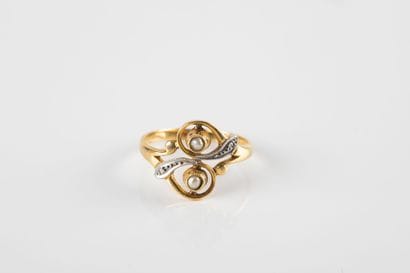 Yellow gold ring, representing two moving...