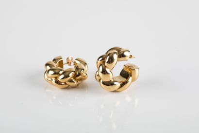 Pair of earrings in yellow gold Creole shape...