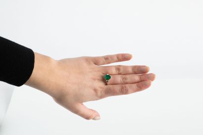 Yellow gold ring set with an oval emerald...