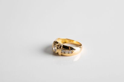 Gold ring set with a brilliant-cut diamond...